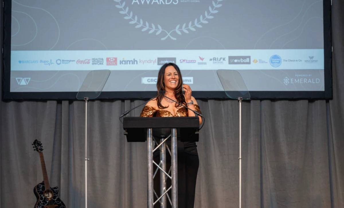 Sadie hosting an awards ceremony