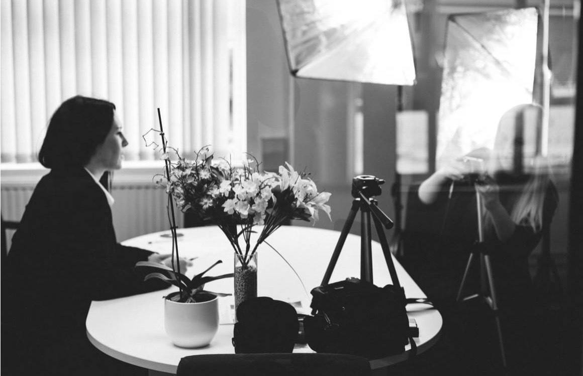 Black and white photo of Sadie during a filmed interview